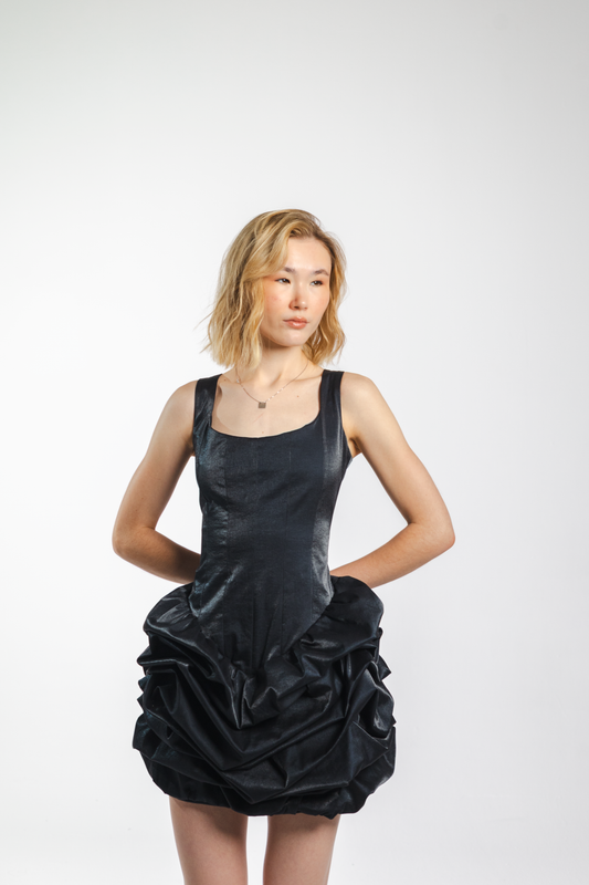 Luna Dress – black cotton satin dress with fitted waist-accentuating top and flared draped skirt, front view