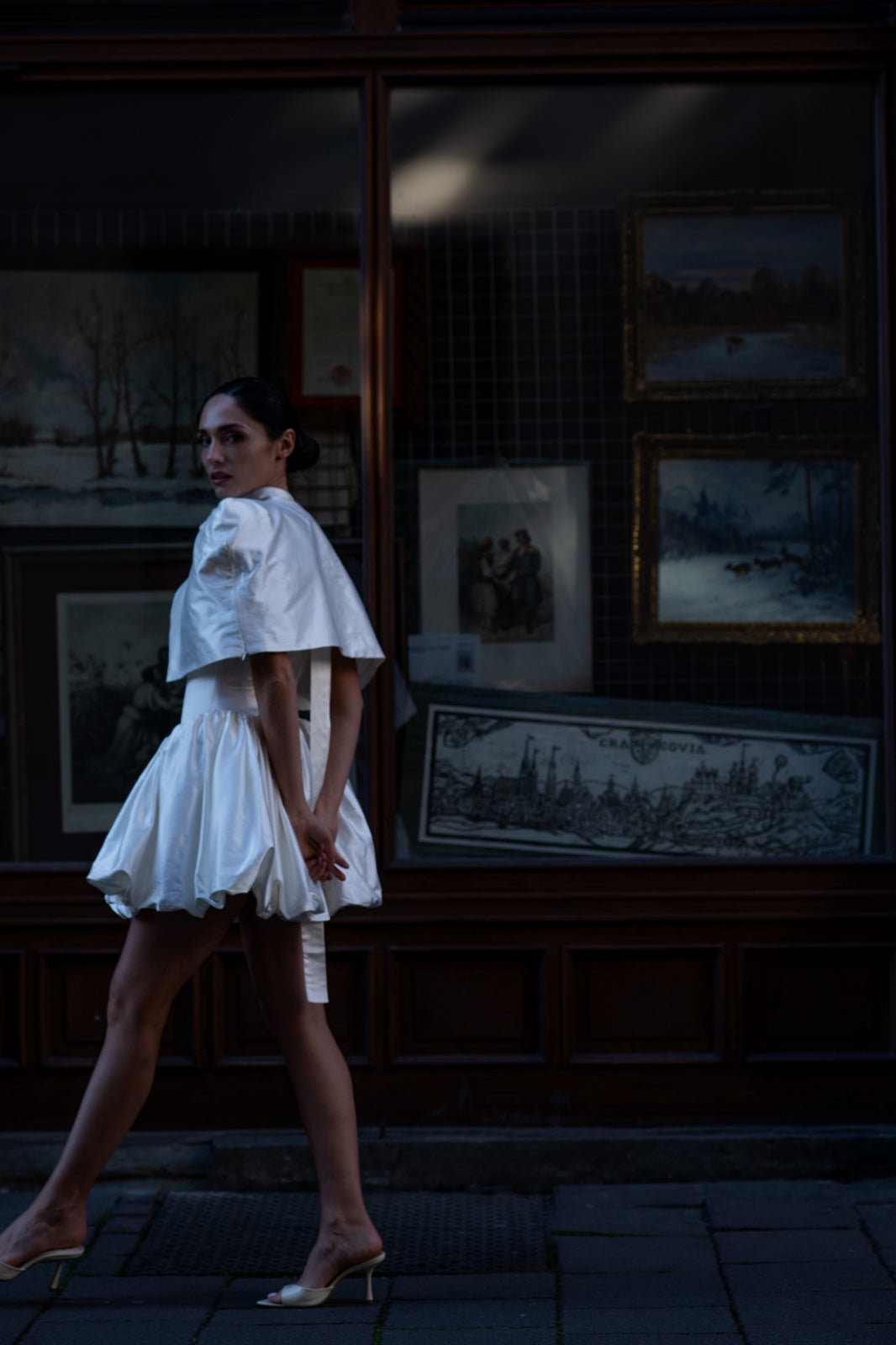Reverie Satin Cape in white – reversible satin cape, back view, minimalist polished silhouette