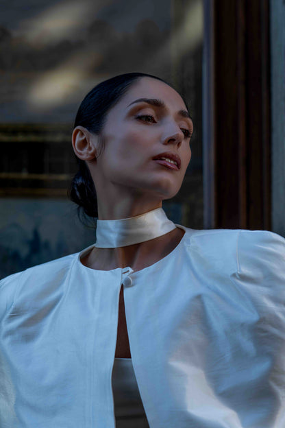 Reverie Satin Cape in white – elegant cotton satin cape styled for formal or everyday look