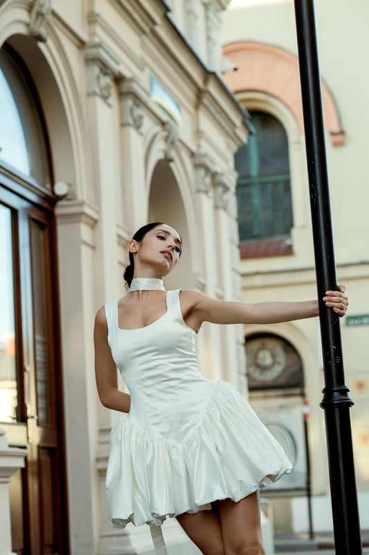 Selena Dress in white – full length view, flared satin skirt, feminine silhouette