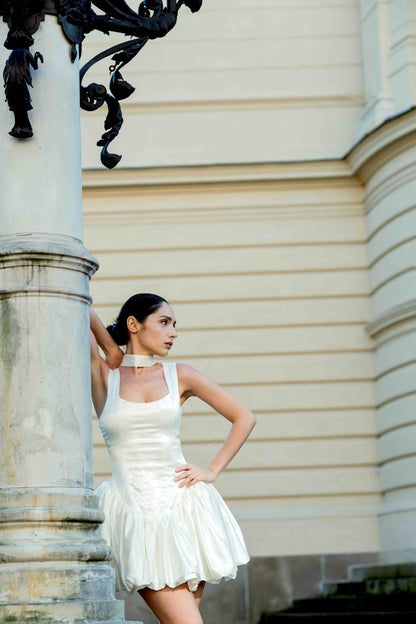 Selena Dress in white – cotton satin dress with corset-style fitted top and flared short skirt, front view